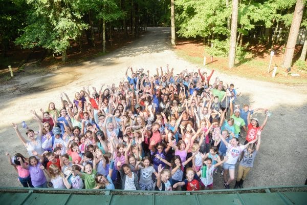 Campers hands up cheering at Summer Camp at Triple R Ranch in Chesapeake